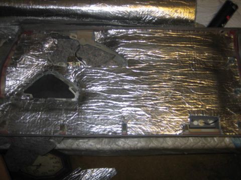 1996 Ford Thunderbird - Car door panel interior, modified with sound deadening material for noise reduction.