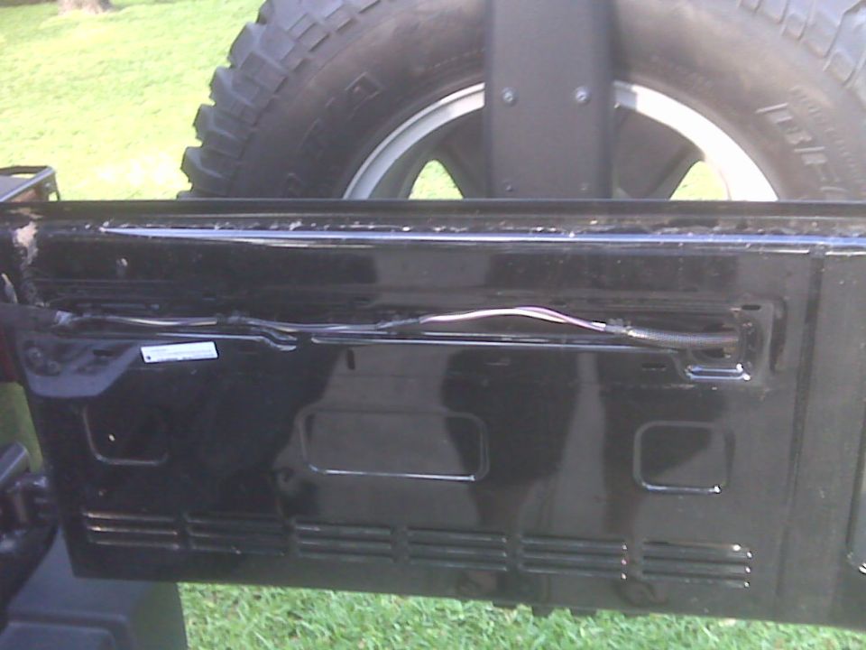 2007 Jeep Wrangler rear bumper with spare tire mounted