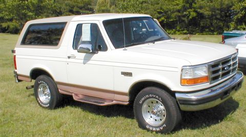 1983 Ford Bronco - This white Ford Bronco has a distinctive grille and headlight design, indicating a later model year than claimed.