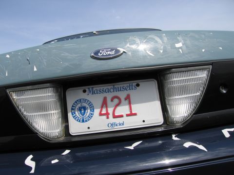 2001 Ford Crown Victoria - Rear view of a 2001 Ford Crown Victoria showing a Massachusetts license plate and a scratched trunk lid.
