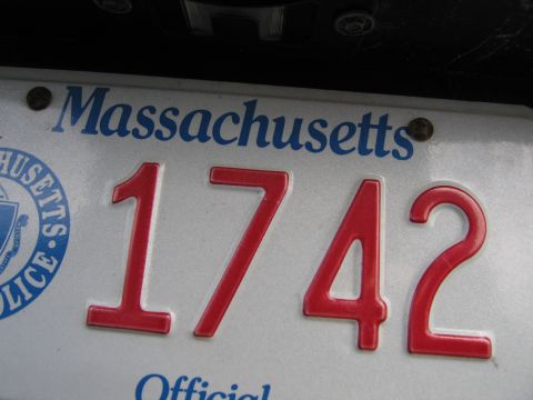 2001 Ford Crown Victoria - Close-up of a Massachusetts license plate displaying the number 1742.