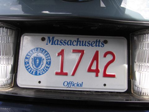 2001 Ford Crown Victoria - Close-up of a Massachusetts State Police license plate on the rear of a vehicle.