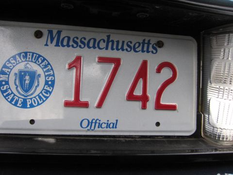 2001 Ford Crown Victoria - Massachusetts State Police license plate shows the number 1742 and the word Official.