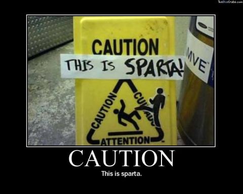 1990 Ford Bronco - A humorous take on a caution sign, altered to read 'This is Sparta!'.