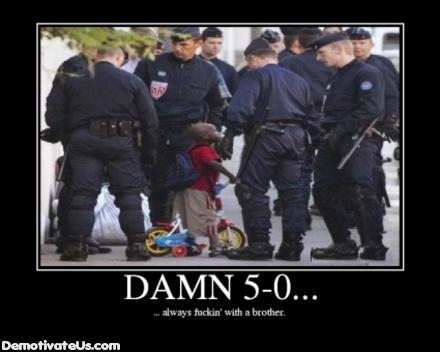 1990 Ford Bronco - A group of police officers surround a young child with a small bicycle.
