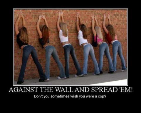 1990 Ford Bronco - A group of women are posed against a brick wall with their hands raised.