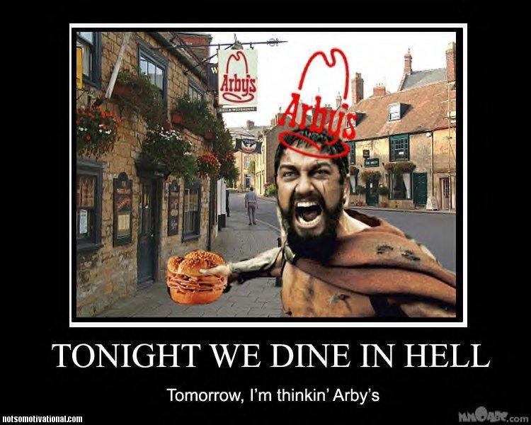 Spartan warrior with Arby's logo on head holding sandwich, Arby's restaurant in background