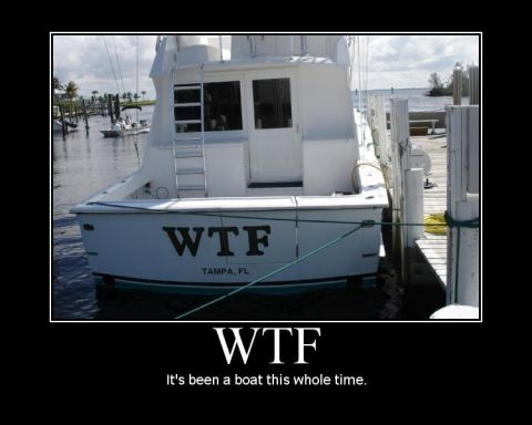 1990 Ford Bronco - This boat has 'WTF' written on its stern, with 'TAMPA, FL' below it.