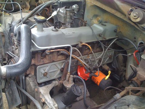 1985 Ford F-150 - Later model valve cover and side cover with new gaskets. All computer controlled wiring removed. Replaced 2 lifters on #1 cylinder. One was…