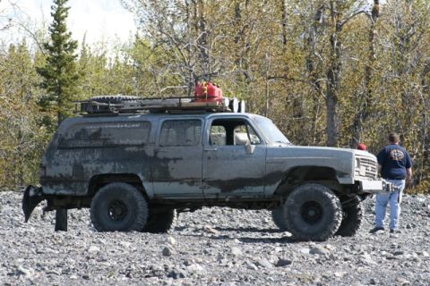 1990 Chevrolet Suburban - This heavily modified Chevrolet Suburban is equipped for off-road adventures, a roof rack and extra fuel cans.