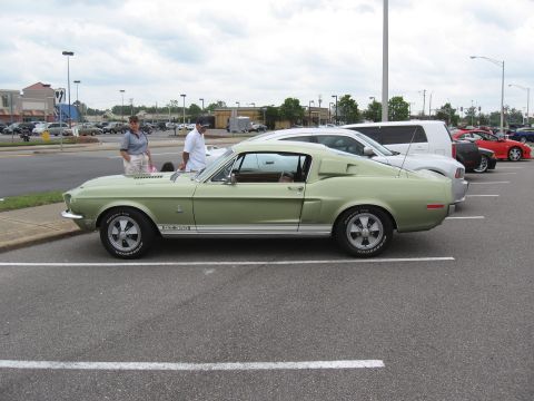 1968 Shelby GT500 - This 1968 Shelby GT500 is seen in a parking lot, its distinctive side profile and GT 350 badging.