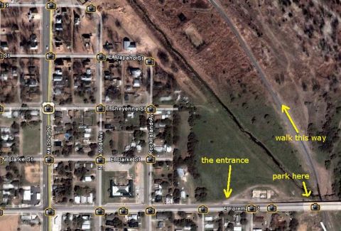 1985 Ford Ranger - An aerial photograph displays a town's layout, including street names and directional arrows.