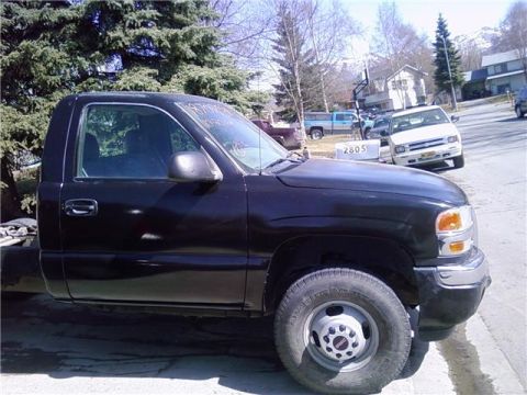 2001 Ford F-350 - This black GMC Sierra pickup truck is a 2003 model, not a 2001 Ford F-350.
