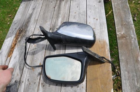 1996 Ford Bronco - Photo of two exterior side mirrors, not a technical document.