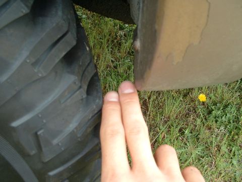 1994 GMC Suburban - Clearance at the back of the front fender with wheels turned to closet point to the fender.