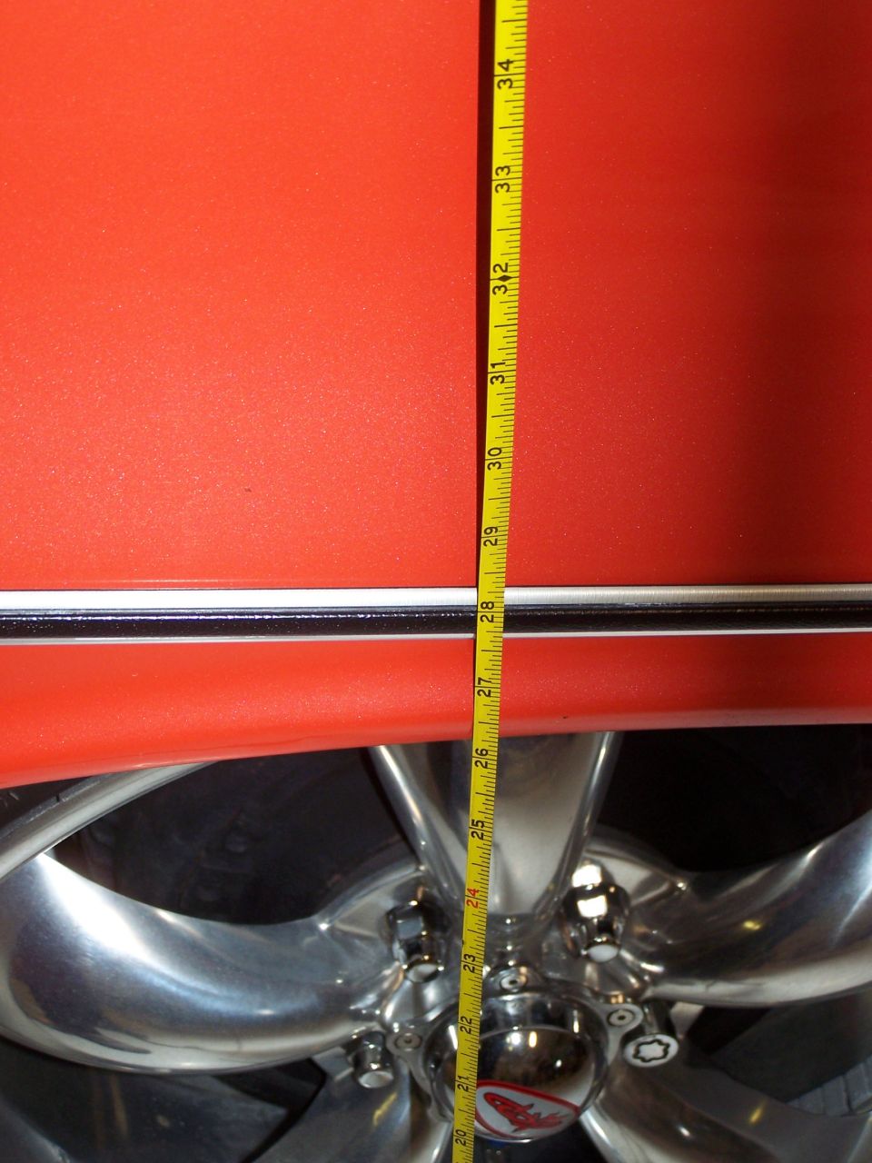 this is the rear fender height with the modified Ford rear coil springs installed; about 26.5" high; the car looks good, but the ride is not great since there is only about 1.5" of travel till the rearend hits the bumpstops.