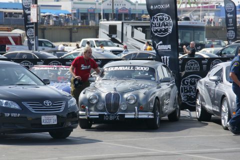 1993 Ford Taurus - A classic grey sedan, possibly a Jaguar, participates in the Gumball 3000 rally event.