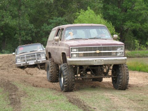 1993 Ford Bronco - Suburban yanking a dumbass who had no business being in the hole...