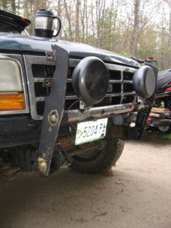 1993 Ford Bronco - The grille and headlight design suggest this Ford truck is from the early to mid-1990s, likely a 1992 model.