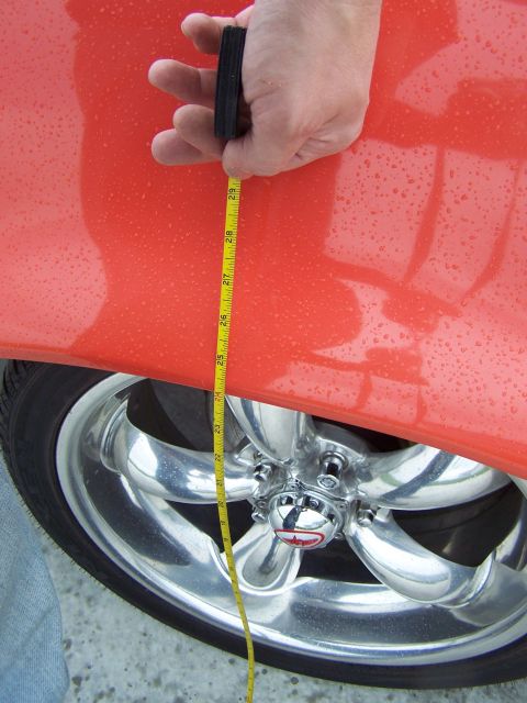 1973 Ford Ranchero - right hand front fender height, with 'lowered' coil springs installed {new big-block coils with 1.5 coils cut off} fender height is about 2…