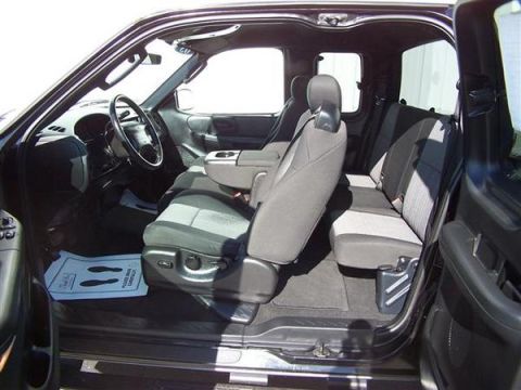 2007 Ford Mustang - Interior view of a truck showing the front and rear seating areas.