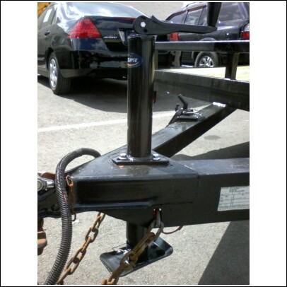 2005 Ford F-250 - Trailer hitch assembly with a black car visible in the background.