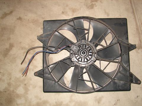 1996 Ford Bronco - An electric cooling fan is shown, likely a replacement part for a vehicle.