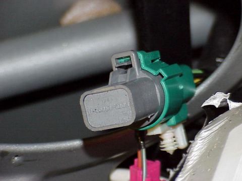 2007 Ford Mustang - A close-up view of an electrical connector, likely part of a vehicle's wiring harness.