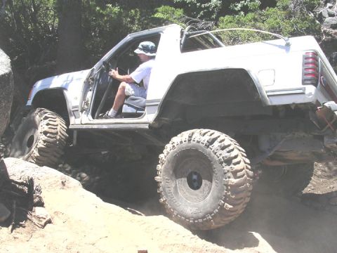 1994 Ford Bronco - This was the toughest spot on the Old sluice, and just beyond the last bypass (the one we should have taken) Dave picks a good line and doe…