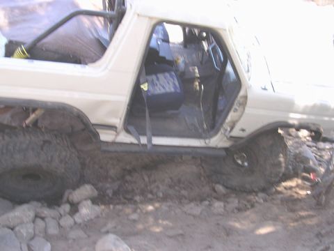 1994 Ford Bronco - here is where he ended up. that 39 shouldnt be that far back. It got wedged up hard against that rock with too much force.