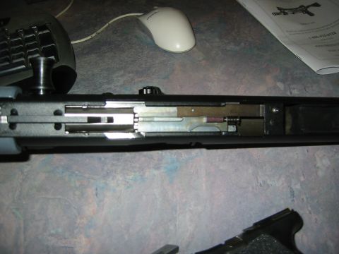 1996 Ford Bronco - A mechanical assembly is shown disassembled on a desk next to a computer mouse and keyboard.