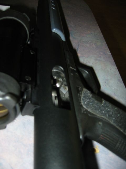 1996 Ford Bronco - Detailed view of a firearm's internal mechanism, showing the trigger assembly and slide.