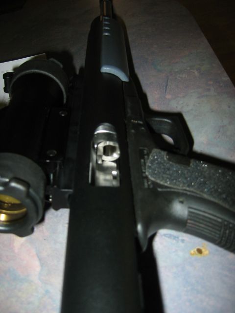 1996 Ford Bronco - This is a close-up view of a firearm, not a vehicle part.