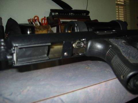 1996 Ford Bronco - Close-up of a gun receiver showing internal components.