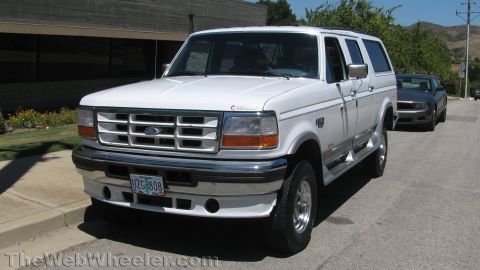 1996 Ford C-350 (Centurion Conversions) - This 1996 Ford C-350 Centurion Conversions SUV is shown from the front three-quarter view.