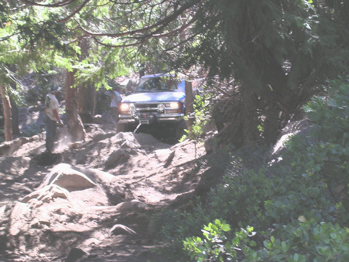 here is one of several times we had to winch Bill in 2WD up Cadillac.  we were beat tired from running lines and driving all day.  We finally got off the trail around 10pm sunday night, without Daves truck
