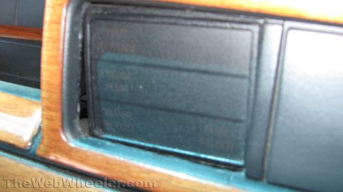 1996 Ford C-350 (Centurion Conversions) - Close-up of the interior trim and a dark window panel, likely from a vehicle.