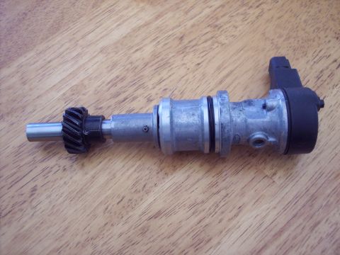 1971 Ford Mustang - This is a close-up view of a car's distributor, a key component in the ignition system.