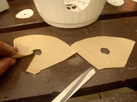 1986 Ford Bronco - Slice up the coffee filter halves like this, with a small hole to allow for the plant stalk.