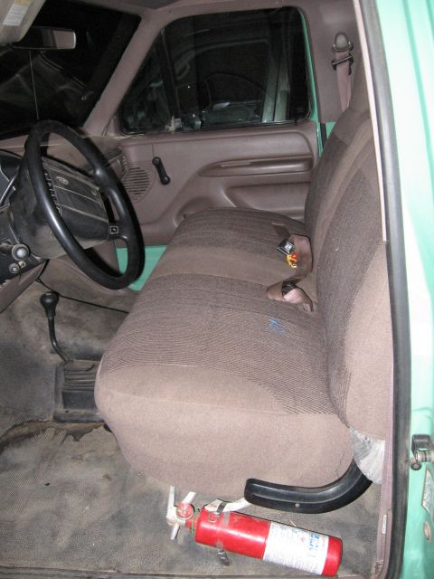 1996 Ford Bronco - Interior view of a 1996 Ford Bronco, the driver's side and front seat.