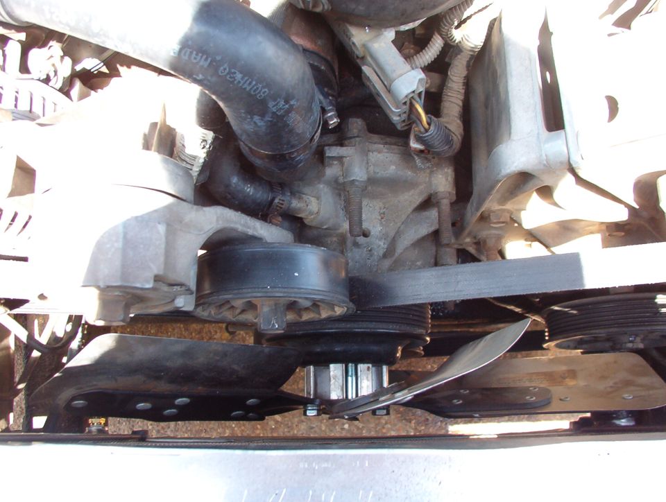 There's NO extra room.  I even had to remove part of the fan spacer to get THIS much clearance.  But even without a shroud, it'll suck a Prius through the grille!