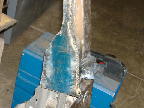 1987 Jeep Comanche - This photo shows a close-up of metalwork, likely a repair, with a visible watermark from Supermotors.net.