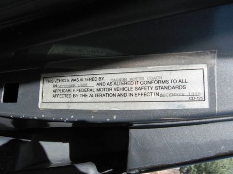 1986 Ford Bronco - A sticker indicates the vehicle was altered by Magnum Motor Coach in December 1988.