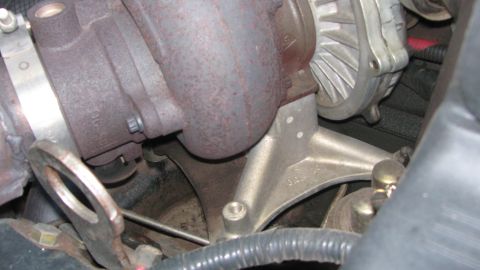1996 Ford C-350 (Centurion Conversions) - Close-up view of a turbocharger assembly, likely from an engine bay.