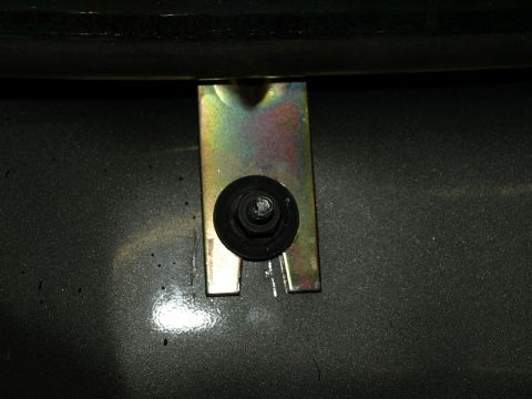1999 Ford Crown Victoria - A close-up view of a metal bracket and bolt assembly, with a Supermotors.net watermark in the corner.