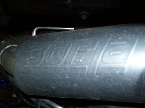 2007 Ford Mustang - Close-up of a BORLA exhaust muffler, showing the embossed brand logo.