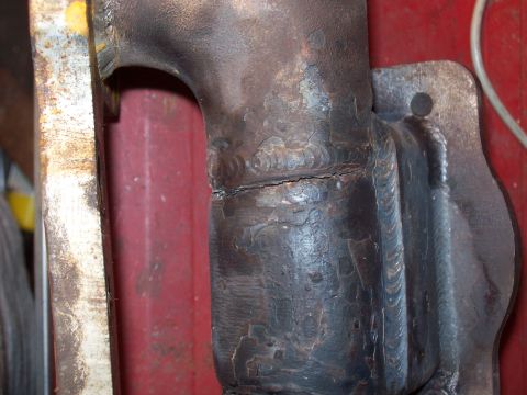 1986 Toyota Hilux - This exhaust manifold shows significant cracking and evidence of previous weld repairs.