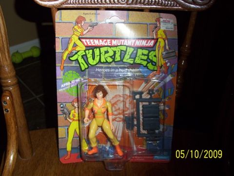 1991 Ford Bronco - This is an April O'Neil action figure from Teenage Mutant Ninja Turtles, packaged for sale.