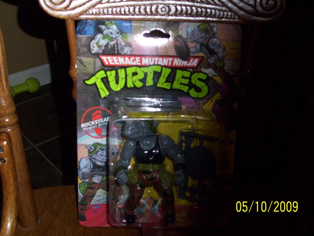 Teenage Mutant Ninja Turtles Rocksteady action figure in blister pack, front view
