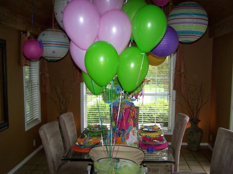 1978 Ford Bronco - A dining table is decorated with balloons and party favors for a celebration.